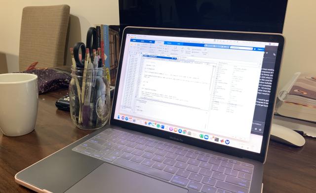Desk Workspace with Computer and Work