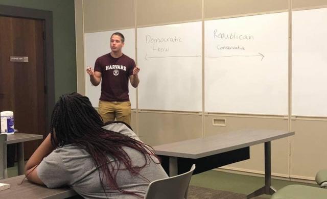 Student Presenting at Whiteboard