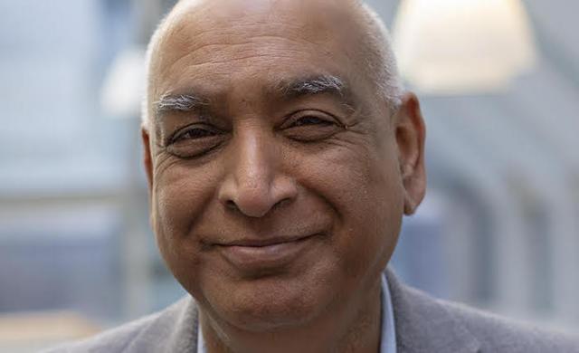 A headshot of professor Shiv Pillai.