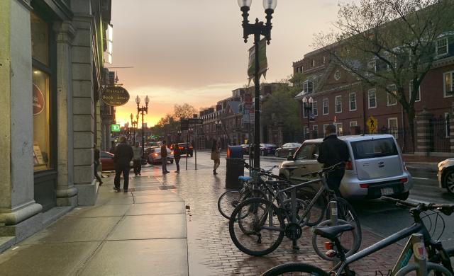 Harvard sunset picture in front of Harvard Bookstore