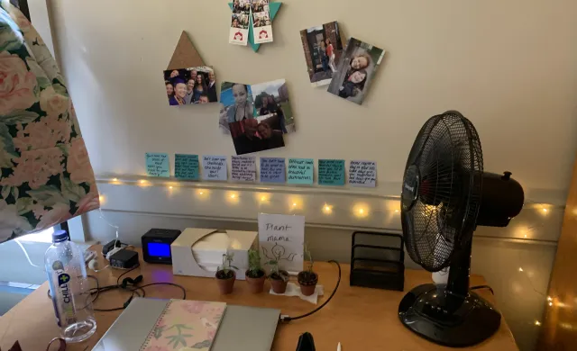 A desk and study space in a Harvard first-year student's dorm