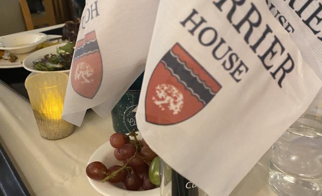 flags with Currier House emblem on them