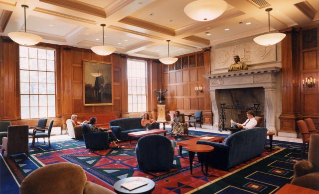 A room filled with people sitting on chairs
