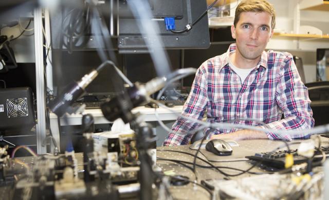 Robert Wood in a robotics lab. Photo credits to Eliza Grinnell, SEAS.
