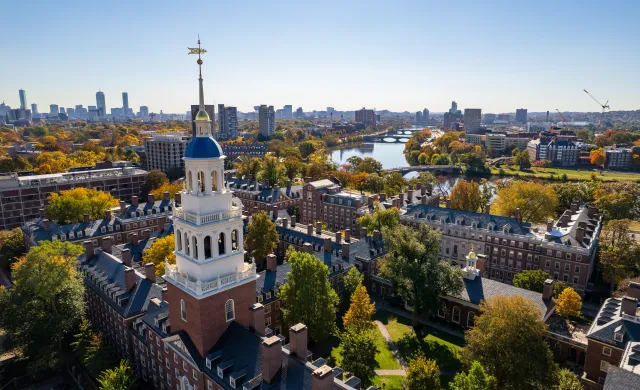 An aerial view of Lowell House tower overlooking the Charles River.