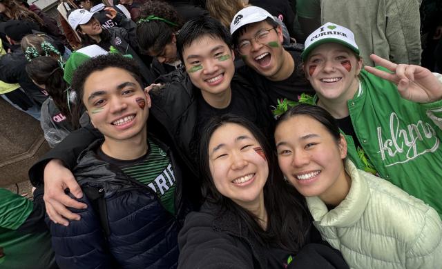 A group picture of the author and his blocking group smiling at the camera in Currier-themed merchandise.