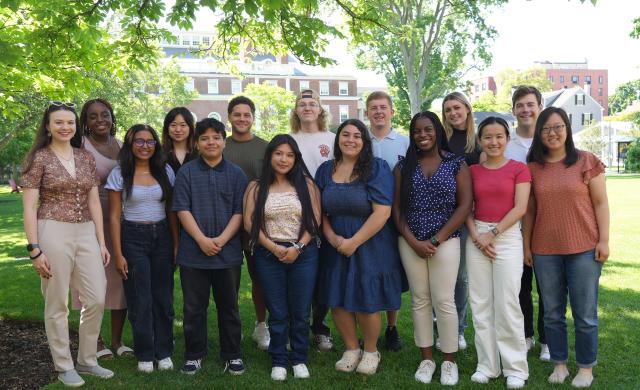 Student Interns posed on the grass of Radcliffe Institute.
