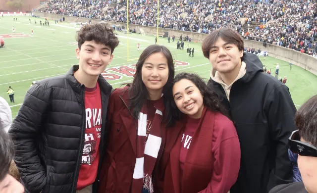 Aileen with her friend at a Harvard Yale Game