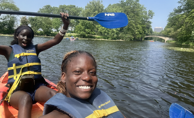My co-worker Nyankiir and I kayak down the Charles River.