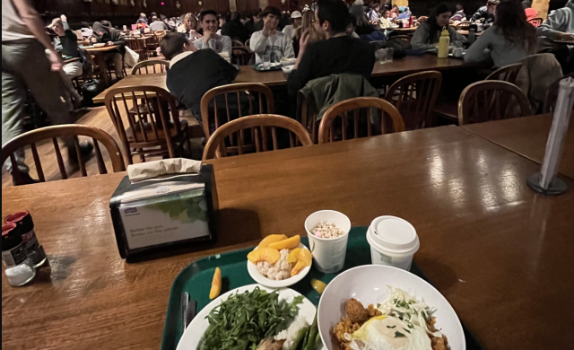 A view of Annenberg hall with a table with food in a tray.