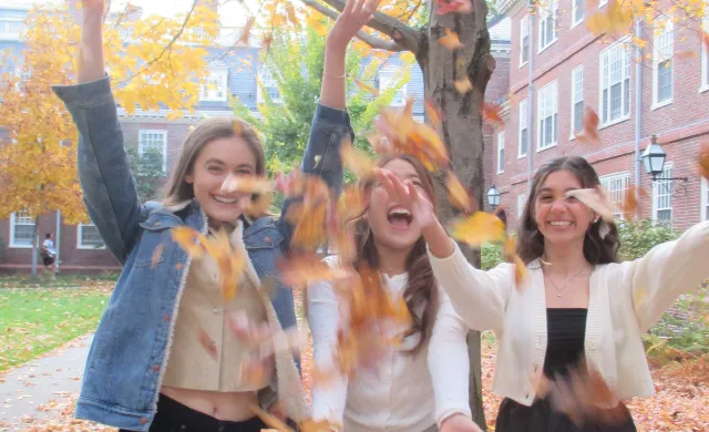 Friends and I throwing leaves