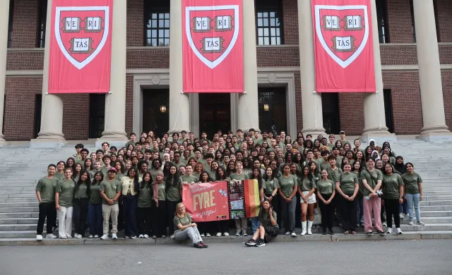 A First-Year Retreat & Experience pre-orientation group photo by Widener Library