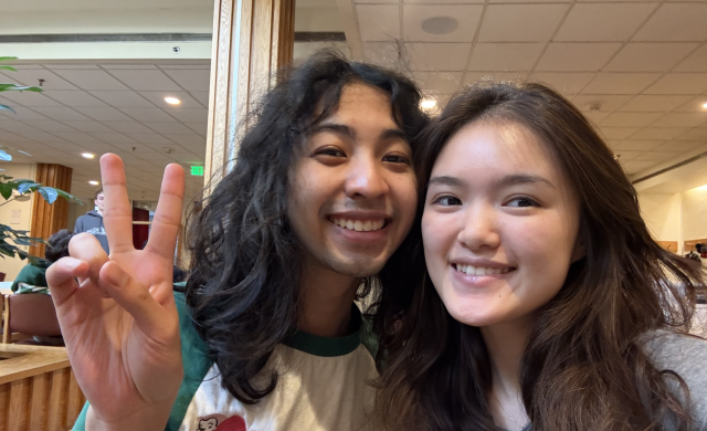 Mollie and Kai posing for a selfie for the interview.