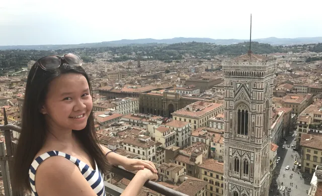 Author on balcony looking out across Florence 