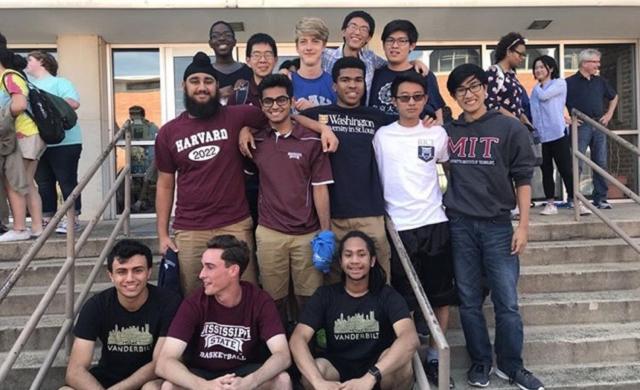Harpreet and his high school friends posing on College Reveal Day!