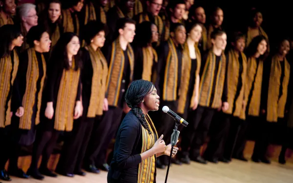 Harvard Kuumba singers performing on stage