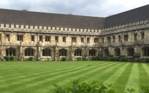 Manicured lawn in front of an old building