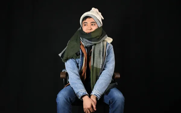 Person wearing many layers of clothing