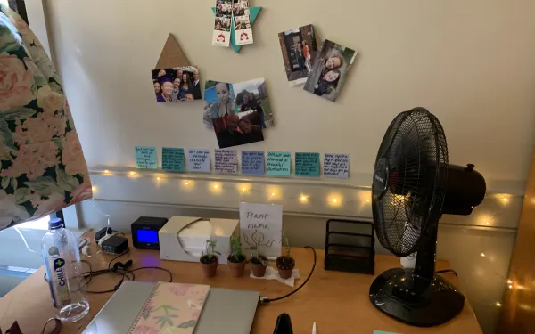 A desk and study space in a Harvard first-year student's dorm