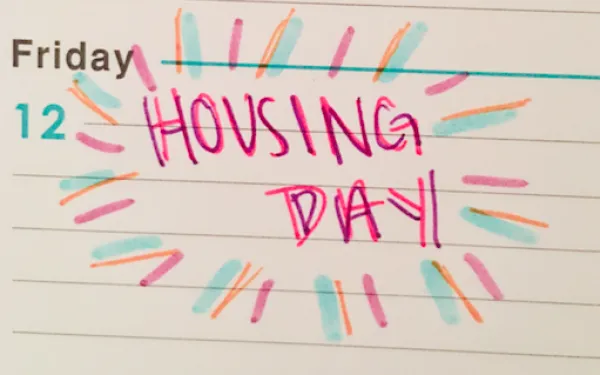 I wrote 'Housing Day' on my agenda's calendar.