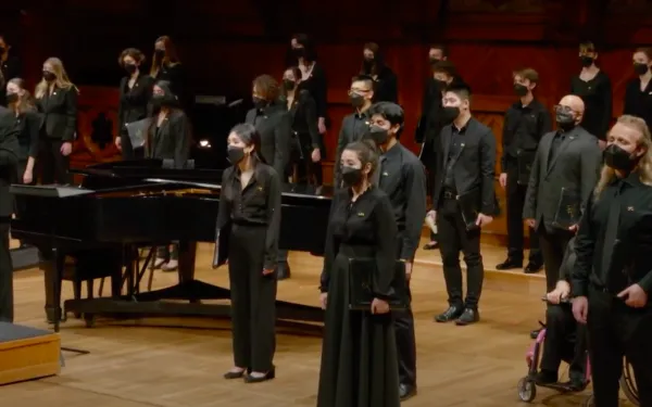 A picture of the Harvard-Radcliffe Collegium Musicum singing at Reunion: A Fall Concert.