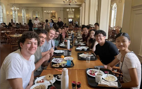 First-years from Class of 26 eating breakfast in Kirkland Dining Hall