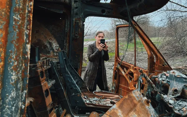 Belkis Wille '08 surrounded by metal scraps