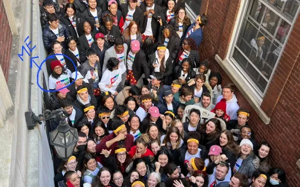 Students crowding in front of Adams house