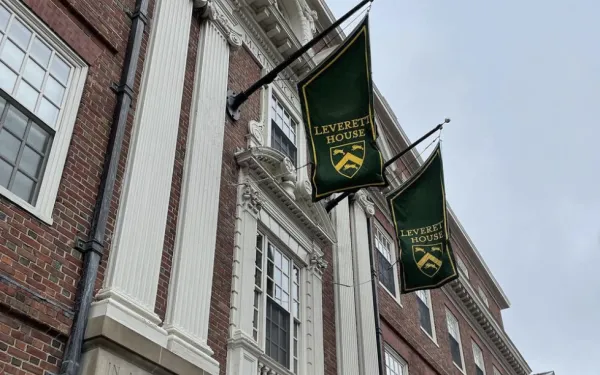 Leverett House flags in front of building