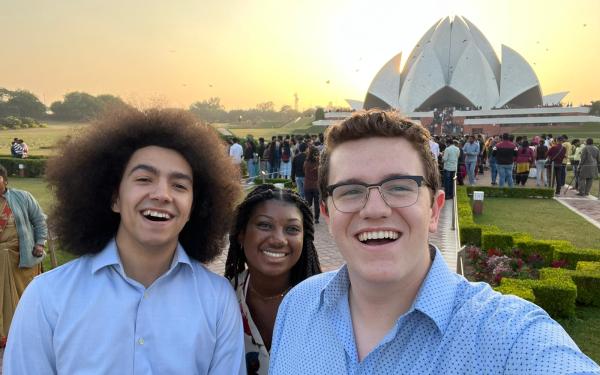 Myself and two friends in front of the Lotus temple on our trip to Delhi