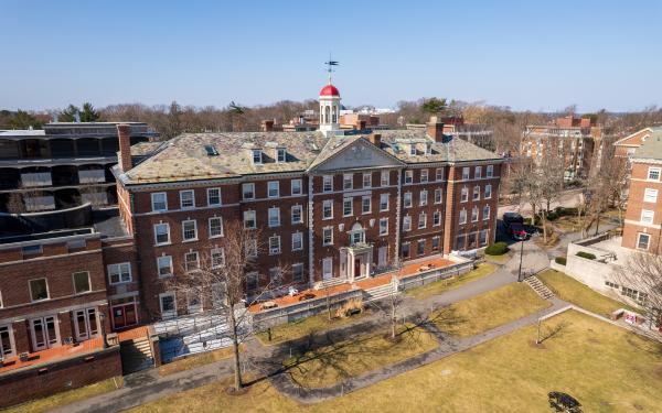 The facade of Cabot House in early spring.