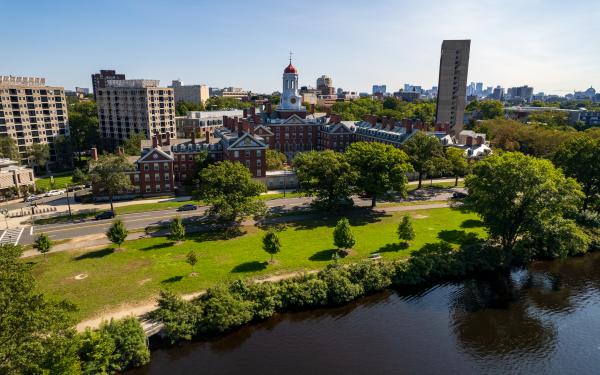 An aerial photo of Dunster House and the banks of the Charles River.