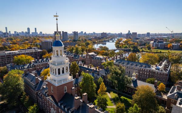 An aerial view of Lowell House tower overlooking the Charles River.