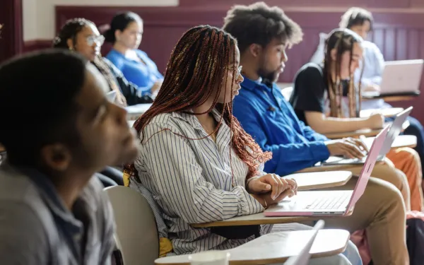 Students taking notes in class