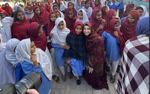 Samia Afrose with students at an all girl's school