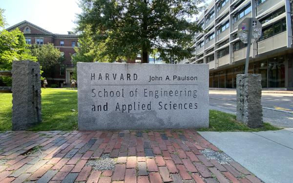 An image of the Harvard John A. Paulson School of Engineering and Applied Sciences sign in front of Pierce Hall. 