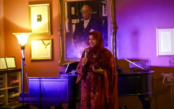 Samia Afrose, President of BASHA speaking about the Flood Relief Fundraiser for Bangladesh.