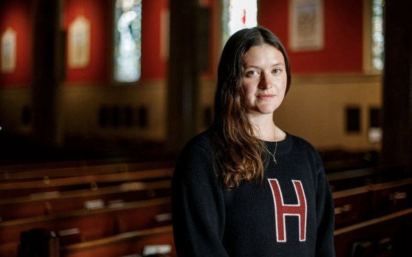 Faith Schmidt ’25 inside St. Paul’s Parish in Harvard Square.