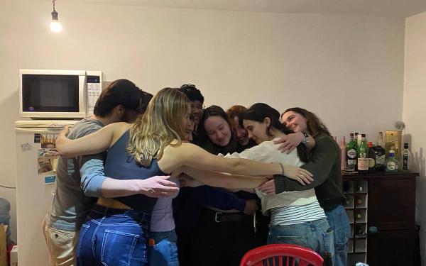 Rafid in the middle of a giant group hug with his friends from study abroad in Ushuaia, Argentina.