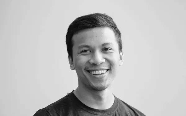 Headshot of Nghia Nguyen in grayscale color