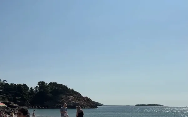 Beach with girl in corner of photo