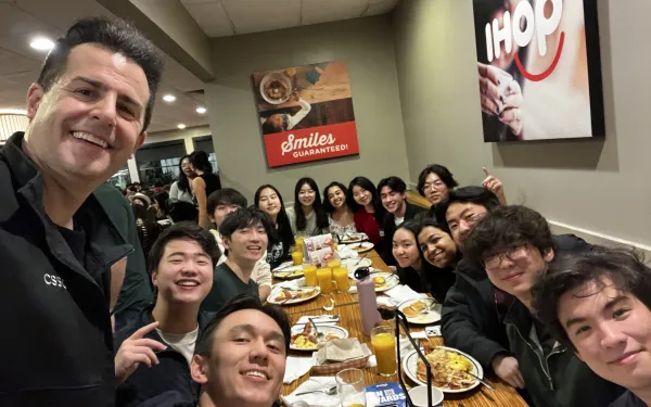 Group photo of CS50 Hackathon group at IHOP Breakfast