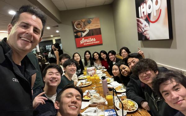 Group photo of CS50 Hackathon group at IHOP Breakfast
