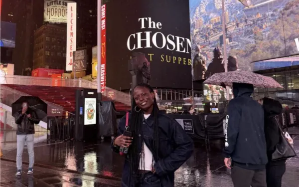 I smile for a photo at Times Square in New York City.