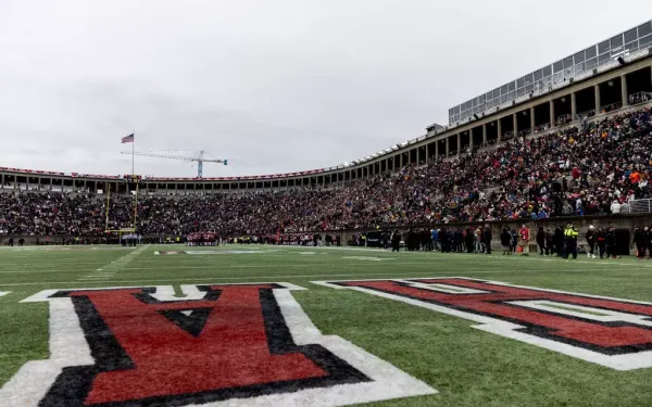 Football stadium packed with fans.