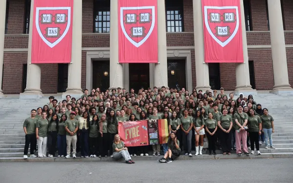 A First-Year Retreat & Experience pre-orientation group photo by Widener Library