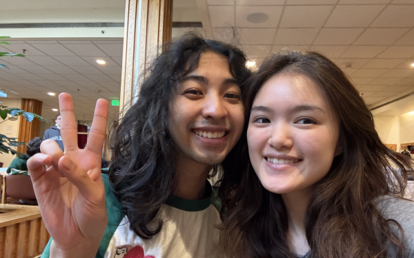 Mollie and Kai posing for a selfie for the interview.