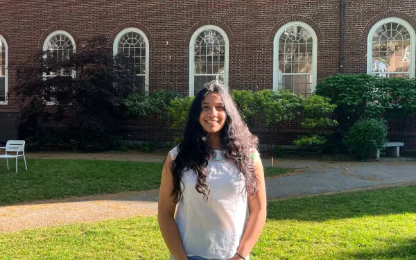 Oneli Perera outside on the Harvard campus.