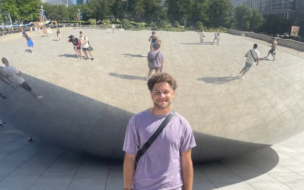 Eli Standing in Front of The Bean in Chicago