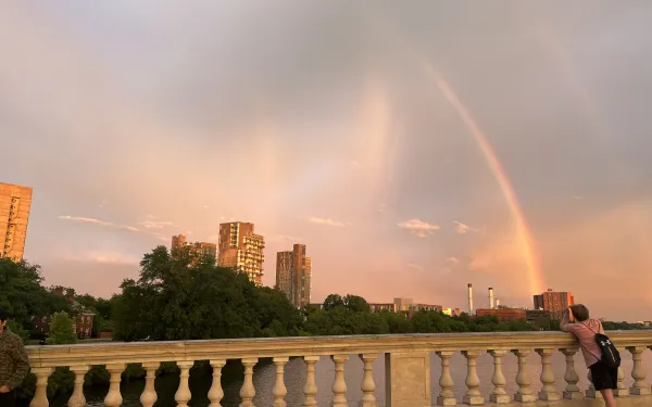A view of a rainbow sunset from the pedestrian bridge